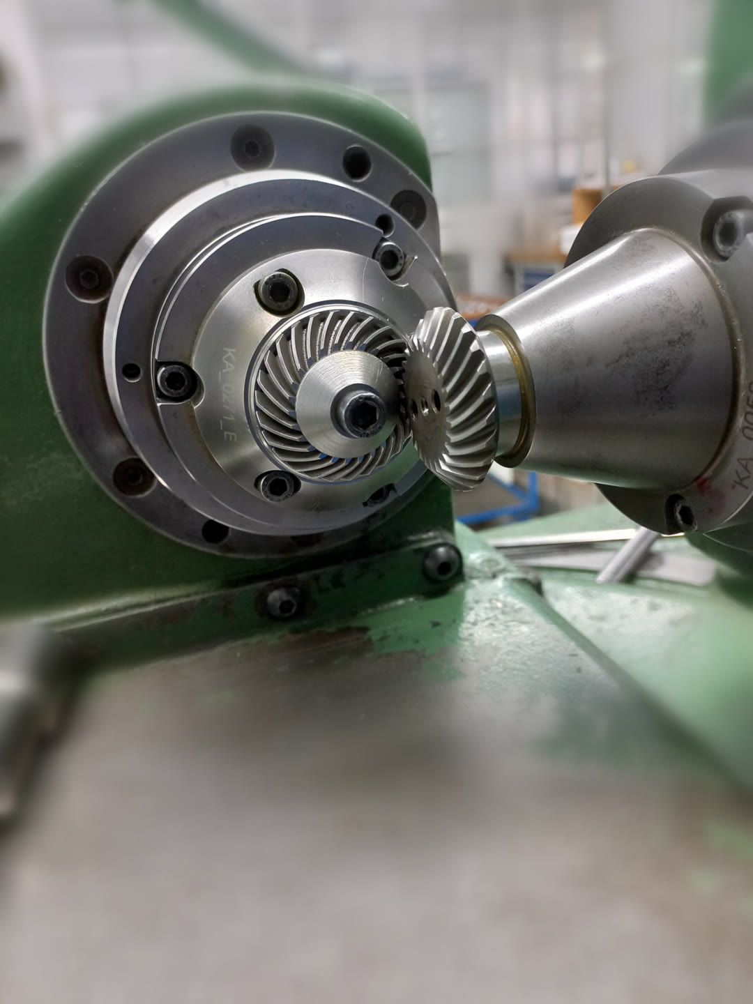 Close-up of the spiral bevel mesh showing the curved teeth in contact